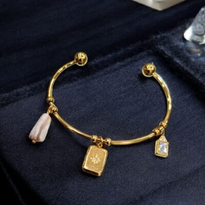 ​Anti-Tarnish Golden Cuff with Star Medallion & Pearl Charms