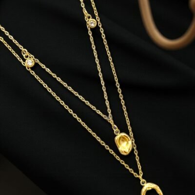 Anti-Tarnish Layered Gold Chain with Stone & Pearl Charms.